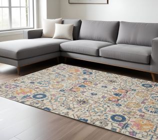 8' X 10' Ivory And Blue Floral Area Rug
