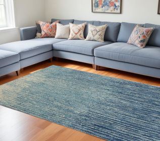 8' X 10' Blue And Ivory Abstract Area Rug