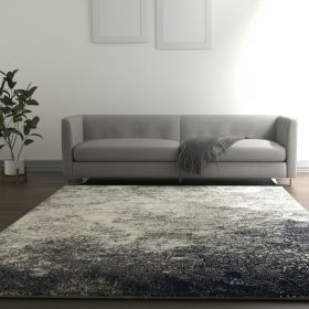 5' X 7' Gray And Ivory Abstract Area Rug