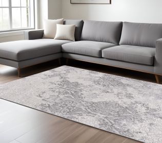 8' X 11' Cream And Gray Tinted Ogee Pattern Area Rug