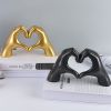 Abstract Heart Hands Resin Sculpture