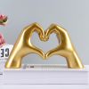 Abstract Heart Hands Resin Sculpture